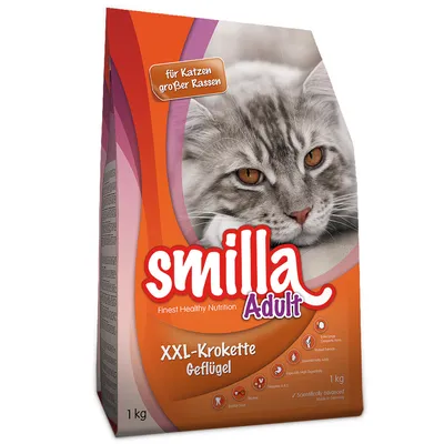 Упаковка корма для кошек Smilla Adult XXL-Krokette Geflügel, 1 кг. Видна надпись: für Katzen großer Rassen. На упаковке изображён серый кот.