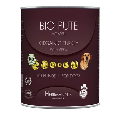 Lata de Herrmann's BIO PUTE mit Apfel, Organic Turkey with Apple, para perros. Certificado ecológico BIO, CO2 neutral. Imagen de un perro y rodajas de manzana en la etiqueta.