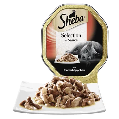 Sheba Selection in Sauce mit Rinderhäppchen kattenvoer, verpakking met afbeelding van grijze kat en stukjes vlees in saus op een bordje. Tekst deels in het Duits.