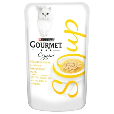 Purina Gourmet Crystal Soup -pussi, kannessa valkoinen kissa, lautasella liemessä kananpalasia. Teksti: köstliche Brühe mit naturbelassenem Huhn, délicat bouillon avec du poulet naturel.
