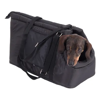Sac de transport noir en tissu avec anses, poche zippée sur le côté, chien à poils courts marron et noir visible la tête sortie du sac.