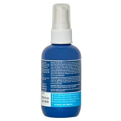 Flacon spray albastru cu instrucțiuni în limba engleză și text vizibil: Non-irritating & promotes healthy tissue, Non-toxic, Safe for all animal skin types, No alcohol, steroids or antibiotics.