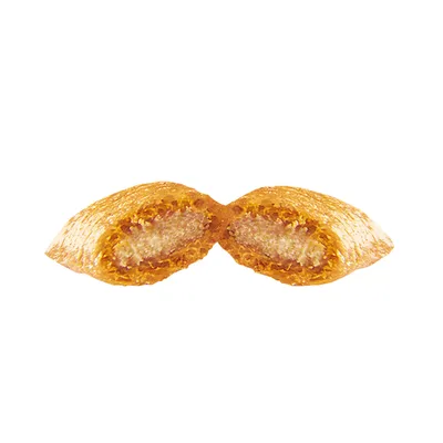 Close-up of a filled pet treat, cut in half to show crunchy outer layer and soft inner filling.