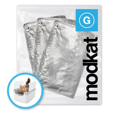 Tre silverfärgade påsar med öglor, förpackning med texten modkat och blå symbol med bokstaven G. Liten bild visar katt i vit låda med insats.