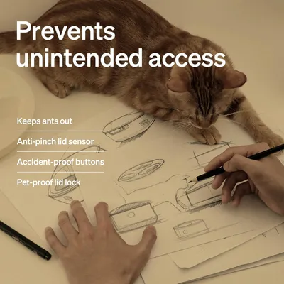 Text: Prevents unintended access. Keeps ants out, Anti-pinch lid sensor, Accident-proof buttons, Pet-proof lid lock. Kočka leží na papírech s náčrty výrobku a rukou s tužkou.
