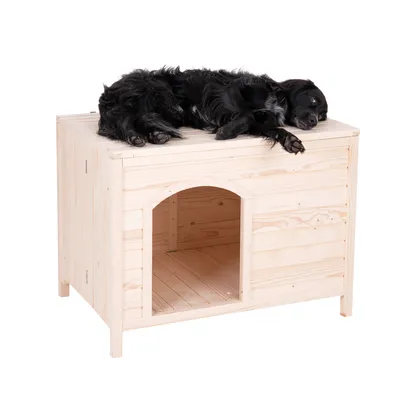 Niche en bois clair avec un chien noir allongé sur le toit, entrée en arche visible à l’avant. Matériau : bois.