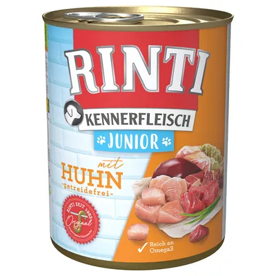 Rinti Kennerfleisch Junior mit Huhn, getreidefrei. Original. Reich an Omega3. Dåse med synlige stykker kød og indmad på etiketten.