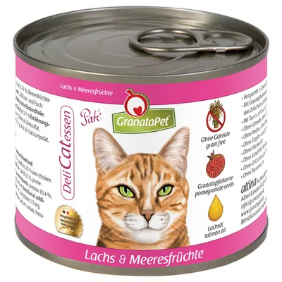 Lata de paté GranataPet DeliCatessen para gatos, sabor salmón y mariscos. Etiqueta: sin cereales, semillas de granada, aceite de salmón. Imagen de un gato en el envase.