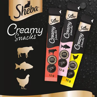 Sheba Creamy Snacks -kissanherkut, kolme makua: naudanliha, kala ja kana. Pakkauksessa teksti: OHNE ZUCKERZUSATZ, OHNE KÜNSTLICHE AROMASTOFFE. Yksi annos 12 g.
