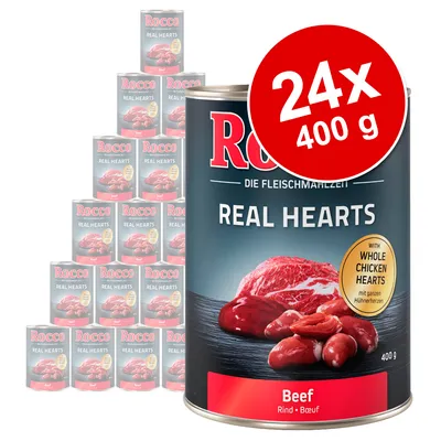 Rocco Real Hearts Beef våtfoder, 24 x 400 g burkar. Text: 'WITH WHOLE CHICKEN HEARTS', 'Beef', 'Rind', 'Boeuf'. Bild på kött och hjärtan på burkens etikett.