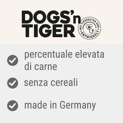 DOGS'n TIGER, percentuale elevata di carne, senza cereali, made in Germany. Testo aggiuntivo in tedesco: MIT TIERÄRZTEN UND ERNÄHRUNGSEXPERTEN ENTWICKELT.