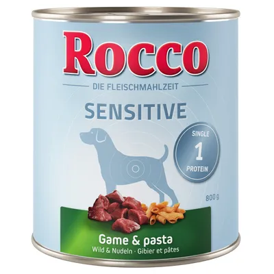 Scatola Rocco Sensitive, Single 1 Protein, Game & pasta, peso 800 g. Immagine di carne e pasta sulla confezione, silhouette di cane visibile.