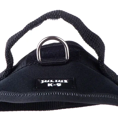 Julius K-9 dog harness with sturdy handle and metal ring for attaching leads, black material.