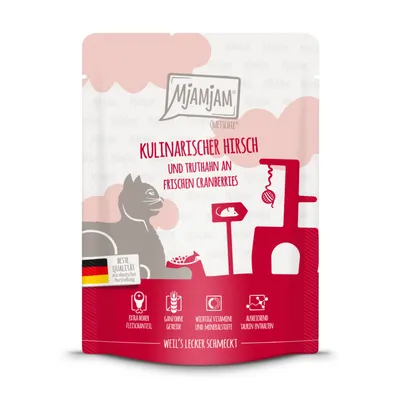 Mjamjam Quetschie Kulinarischer Hirsch und Truthahn an frischen Cranberries, testo in tedesco, bandiera tedesca, icone: alta percentuale di carne, senza cereali, vitamine e minerali, taurina.