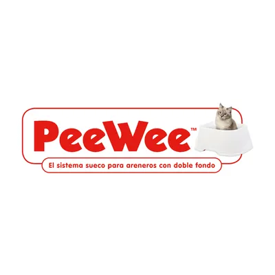 PeeWee. El sistema sueco para areneros con doble fondo. Gato sentado en un arenero blanco.
