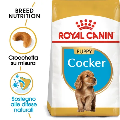 Confezione di Royal Canin Puppy Cocker, testo visibile: 'Crocchetta su misura', 'Sostegno alle difese naturali', immagine di crocchetta e simbolo scudo con virus.