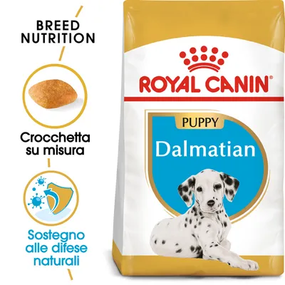 Confezione Royal Canin Puppy Dalmatian, testo visibile: 'Crocchetta su misura', 'Sostegno alle difese naturali', immagine di una crocchetta e cucciolo dalmata.