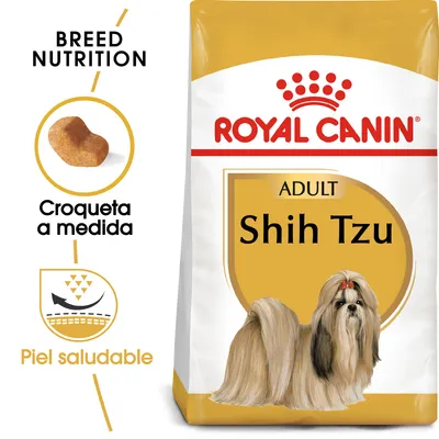 Royal Canin Adult Shih Tzu, croqueta a medida, piel saludable, imagen de perro Shih Tzu en el envase. Texto visible: Breed Nutrition, Croqueta a medida, Piel saludable.