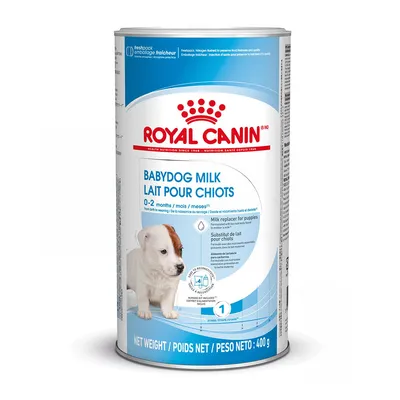Envase de Royal Canin Babydog Milk, leche en polvo para cachorros 0–2 meses. Texto visible en inglés y francés. Peso neto: 400 g.