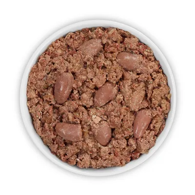 Close-up of wet food in a white bowl, consisting of meaty pieces and whole offal.