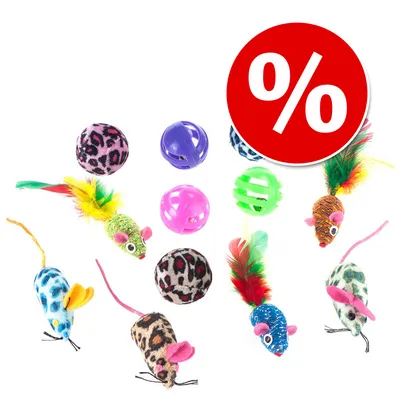 Juguetes para gatos: pelotas y ratones de colores variados con plumas. Círculo rojo con símbolo de porcentaje blanco, indicando oferta o descuento visible en la imagen.