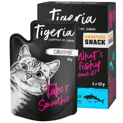 Tigeria Smoothie Snack for cats, 50g pouch. Text: 'Take it Smoothie' and 'What's fishy about it?'. Packaging shows fish graphic and note on 6x50g pack.