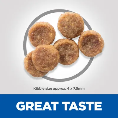 Round kibble pieces shown with text stating kibble size approximately 4 by 7.5 millimetres and great taste.