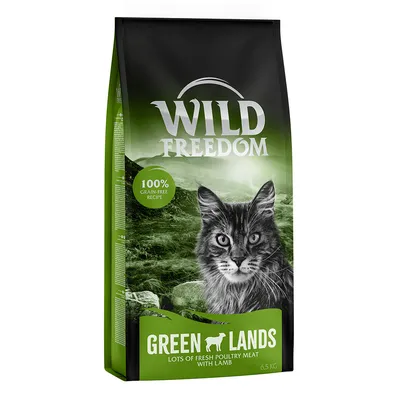 Wild Freedom Green Lands, 100% grain-free recipe, lots of fresh poultry meat with lamb, 6,5 kg. Opakowanie z wizerunkiem kota na tle zielonego krajobrazu.