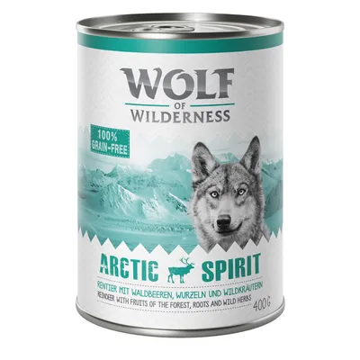 Conservă Wolf of Wilderness Arctic Spirit 400g, etichetă cu text: 100% grain-free, Arctic Spirit, ren, fructe de pădure, rădăcini și ierburi sălbatice. Text în engleză și germană.
