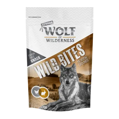 Senior Wolf of Wilderness Wild Bites Meadow Grounds, gustare fără cereale cu pui și iepure. Ambalajul prezintă un lup în fața unui peisaj.