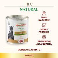 12 lattine Almo Nature HFC Natural tonno skipjack e merluzzo, ricetta senza glutine, immagine di cane sulla confezione, testo multilingue visibile sull'etichetta.