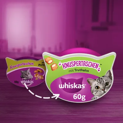 Whiskas Knuspertaschen mit Truthahn, 60g. Verpackung in Katzenkopf-Form, Produktabbildung zeigt knusprige Taschen und Katze.