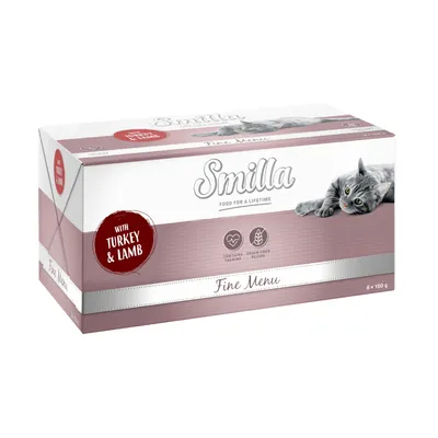 Boîte Smilla Fine Menu pour chat, texte visible : with turkey & lamb, contains taurine, grain-free recipe, 8 x 100 g. Image d’un chat gris sur l’emballage.