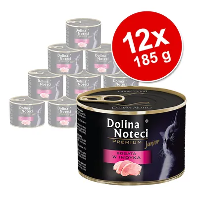 Dolina Noteci Premium Junior, bogat în curcan, 12x 185g conserve. Ambalaj negru cu motiv de pisică și text roz.