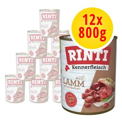 12x800g Rinti Kennerfleisch mit Lamm, confezioni di cibo umido per cani visibili sull'immagine. Testo sulla confezione: 'getreidefrei'.