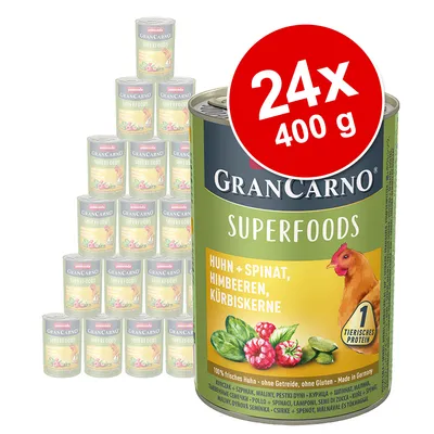 GranCarno Superfoods -kissanruoka, 24 x 400 g. Etiketissä: Huhn + Spinat, Himbeeren, Kürbiskerne. Näkyvissä kana, pinaatti, vadelmat ja kurpitsansiemenet. 1 tierisches protein.