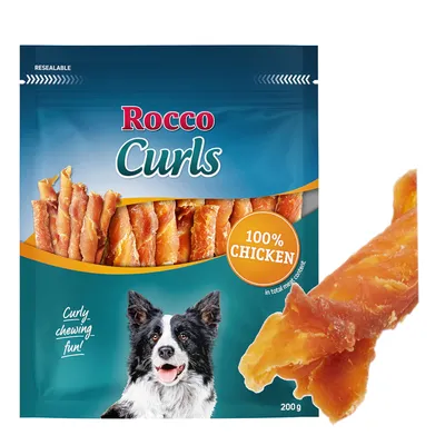 Rocco Curls, 200g förpackning. 100% kyckling, lockig tuggsnacks. Förpackningen visar vridna kycklingstrimlor och en hund.