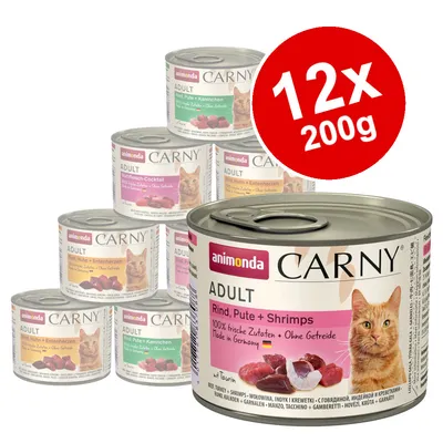 animonda Carny Adult mixed cat food cans, visible flavours include Rind, Pute + Shrimps. Red badge shows 12x200g. Labels show '100% frische Zutaten • Ohne Getreide'. Cat image on each can.