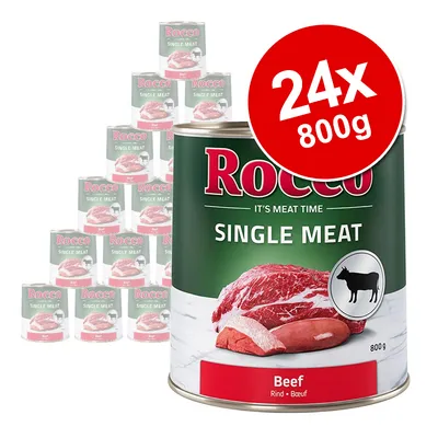 Rocco Single Meat Beef, 24 x 800g tins. Large can in front with beef image and cow icon, stacked cans in background. Red label shows 'Beef' and '24x 800g' in white text.