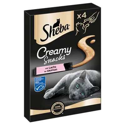 Sheba Creamy Snacks x4, mit Lachs au saumon, sans sucres ajoutés ni arômes artificiels, logo MSC pêche durable, image d’un chat gris allongé sur l’emballage.