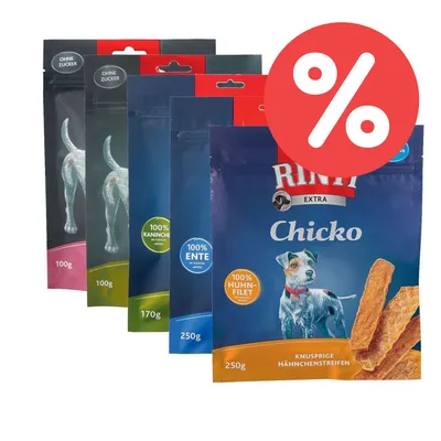 Rinti Extra Chicko Hundesnacks, Sorten: Kaninchen, Ente, Huhn. Ohne Zucker, Packungsgrößen: 100g bis 250g. Knusprige Hähnchenstreifen. Rabatt-Symbol sichtbar. Rinti Extra Chicko Hundesnacks, Sorten: Kaninchen, Ente, Huhn. Ohne Zucker, Packungsgrößen: 100g bis 250g. Knusprige Hähnchenstreifen. Rabatt-Symbol sichtbar.
