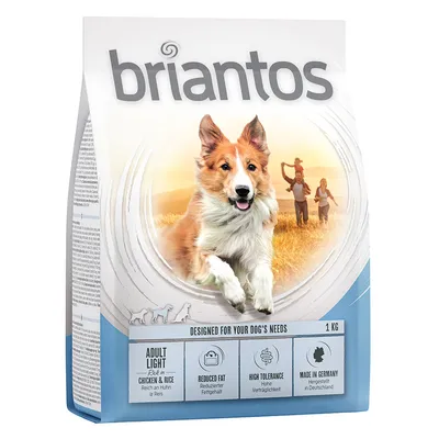 Опаковка Briantos Adult Light Chicken & Rice, 1 кг. Видими са икони: намалено съдържание на мазнини, висока поносимост, произведено в Германия. Текстът е на английски и немски.
