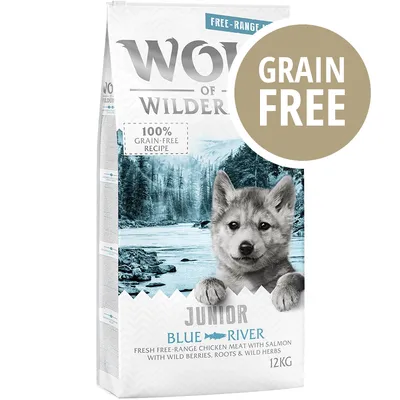 Wolf of Wilderness Junior Blue River, 12 kg, ricetta 100% grain-free, carne di pollo allevato all'aperto con salmone, frutti di bosco selvatiche, radici ed erbe. GRAIN FREE in evidenza.