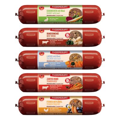 Fleischeslust alimento completo: coniglio con manzo, menu di manzo, salmone con manzo, manzo tenero, pollame fine. Ingredienti visibili: piselli, pastinaca, zucca, carota, mirtilli.