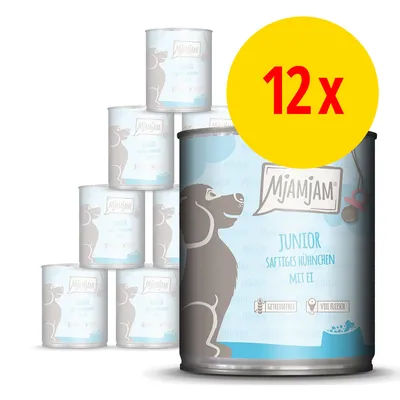 Lot de 12 boîtes MjAMjAM Junior Saftiges Huhnchen mit Ei, texte en allemand, illustration de chien sur l’emballage, mentions Getreidefrei et Viel Fleisch visibles. Lot de 12 boîtes MjAMjAM Junior Saftiges Huhnchen mit Ei, texte en allemand, illustration de chien sur l’emballage, mentions Getreidefrei et Viel Fleisch visibles.