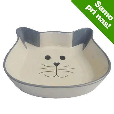Keramična posoda v obliki mačje glave z narisanim obrazom. Zgornji desni kot vsebuje zelen napis: Samo pri nas! Keramična posoda v obliki mačje glave z narisanim obrazom. Zgornji desni kot vsebuje zelen napis: Samo pri nas!