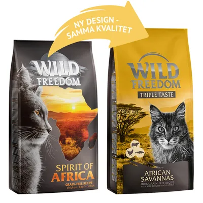 Två förpackningar Wild Freedom kattmat: Spirit of Africa och Triple Taste African Savannas. Text i gul pil: Ny design – samma kvalitet.