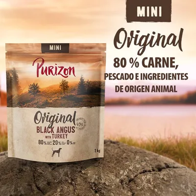 Purizon Mini Original Black Angus with Turkey, 1 kg. 80 % carne, pescado e ingredientes de origen animal. 20 % frutas y verduras, 0 % cereales. Texto visible en el envase y fondo.