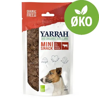 Yarrah Mini Snack, 97% beef pork & chicken, BIO-ORGANIC SINCE 1992, GRAIN FREE RECIPE, ØKO-mærke, gennemsigtig pose med hundesnacks og billede af hund, 100 g