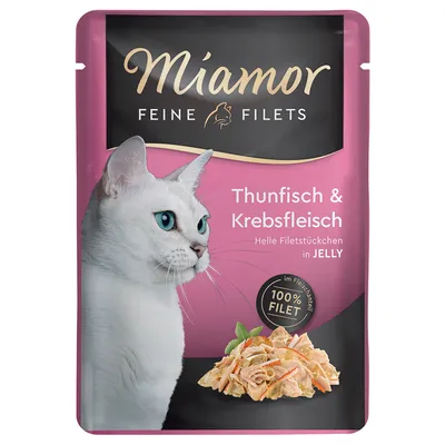 Miamor Feine Filets Thunfisch & Krebsfleisch, Helle Filetstückchen in Jelly, 100% Filet. Texte en allemand sur l’emballage, image d’un chat blanc et morceaux de filet visibles.